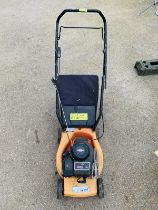 A Grassland petrol mower low emission series PM401. Needs attention