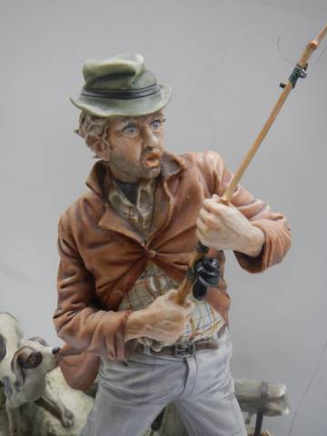 A continental porcelain figure of a fisherman with his dog. COLLECT ONLY. - Image 2 of 6