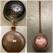 A large victorian copper bed pan 110cm H