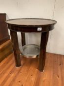 Small round 4 leg table in dark wood