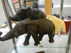Three elephant figures.