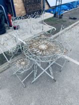 Metal garden set comprising of bench table and 2 chairs