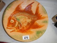 A mid 20th century studio pottery dish.
