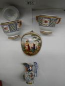 Four pieces of hand painted continental ceramics.
