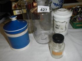 A quantity of chemist bottles etc.,