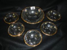 A mid 20th century floral decorated glass fruit set.
