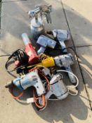 A collection of drills, paint, sprayer, heat gun & quick driver