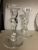 A pair of heavy crystal candle sticks 19cm high
