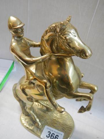 A solid brass rearing horse figure. - Image 2 of 2