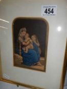 A framed and glazed study of a mother with children.
