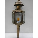 A 20th century brass carriage lamp, 53 cm tall.