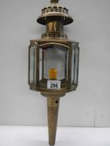 A 20th century brass carriage lamp, 53 cm tall.
