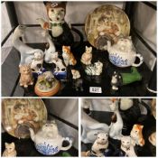 A collection of Cat figures, a tea pot and Royal Worcester plate.