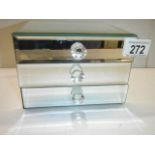 A small three drawer mirrored jewellery chest.