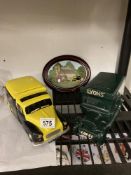 A pair of wade vehicles Rington teas and Lyons coffee plus plaque