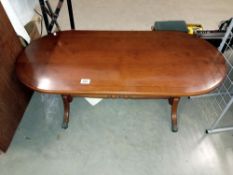 An Oval mahogany coffee table