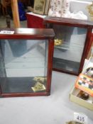 A pair of small mahogany collector's cabinets. COLLECT ONLY.