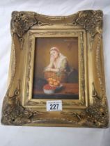 A gilt framed study of a lady.