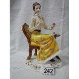 A mid 20th century 'Francesca' porcelain seated lady - Charlotte.