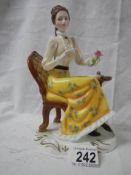 A mid 20th century 'Francesca' porcelain seated lady - Charlotte.