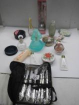 A mixed lot of used perfumes, make up set etc.,