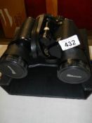 A pair of Pathescope binoculars.