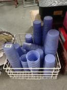 A quantity of more than 70 lilac plastic beakers