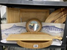 A selection of wooden boards, decorative and chopping boards