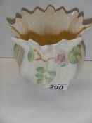 A Belleek bowl in good condition.