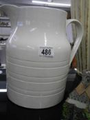 A large ceramic jug.