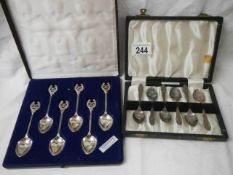 Two cased sets of teaspoons.