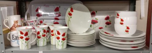 A quantity of Poppy mugs, Tray & Part dinner service