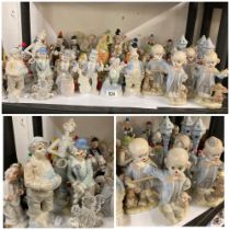 A good collection of ceramic and resin clown figures