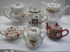 A Royal Doulton Bird decorated teapot (lid a/f) and five others.