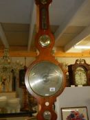 A rosewood barometer (missing tubes in back). COLLECT ONLY.