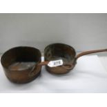 Two old copper saucepans stamped Paris.
