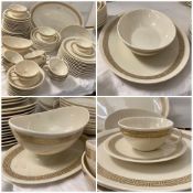 A cream and aztec gold patterned Dinner service "Rondelle" by Lenox Inc, USA. 12 cups, saucers, side