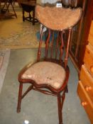 An early 20th century bedroom chair, a/f.