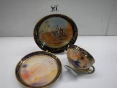 A superb hand painted Noritake trio.