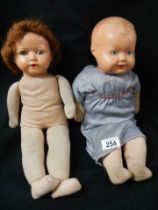 Two mid 20th century dolls.