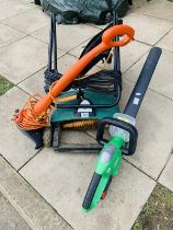Electrical Lawn raker. Electric Strimmer. Both tested & working order. Also a battery powered