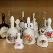 A collection of decorative bells featuring stags and otters plus others