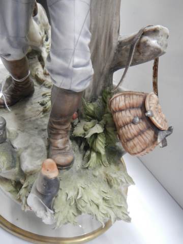 A continental porcelain figure of a fisherman with his dog. COLLECT ONLY. - Image 4 of 6