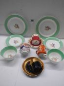 A mixed lot of tea cups, saucers and plates.