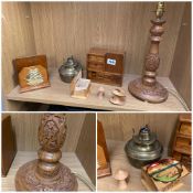 A selection of treen items including a carved lamp base and brass lamp base