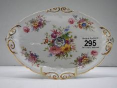 A hand painted porcelain dish by Hammersley and signed F Howard.