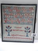 A framed and glazed 1892 sampler by Helen Amelia Brothwell aged nine years.