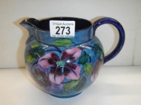 A Maling floral decorated jug.