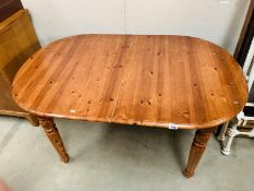 Small pine dining table with internal extending leaf