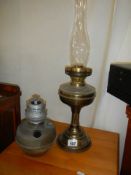 Two brass oil lamps.